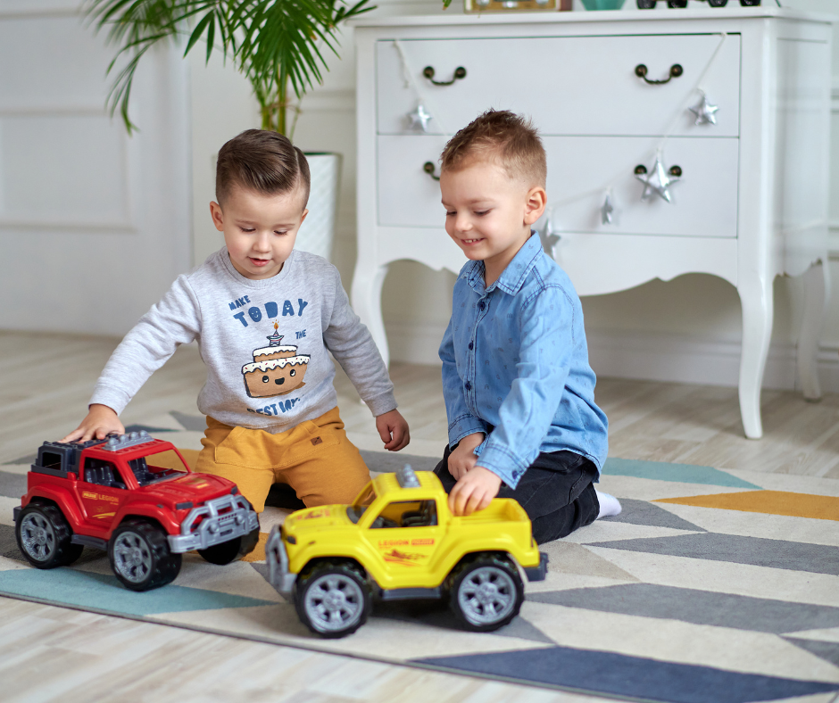 Toddler engaging in gross motor activity, helping to develop physical skills